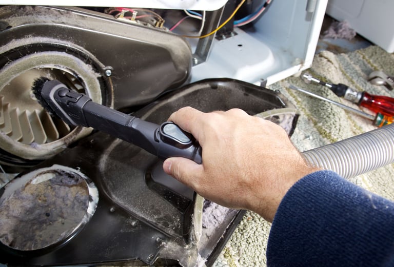 a person holding a brush and a brush in their hand