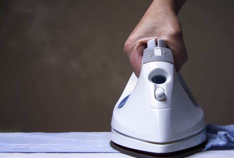 a person is holding a white iron iron iron iron iron iron iron iron iron iron