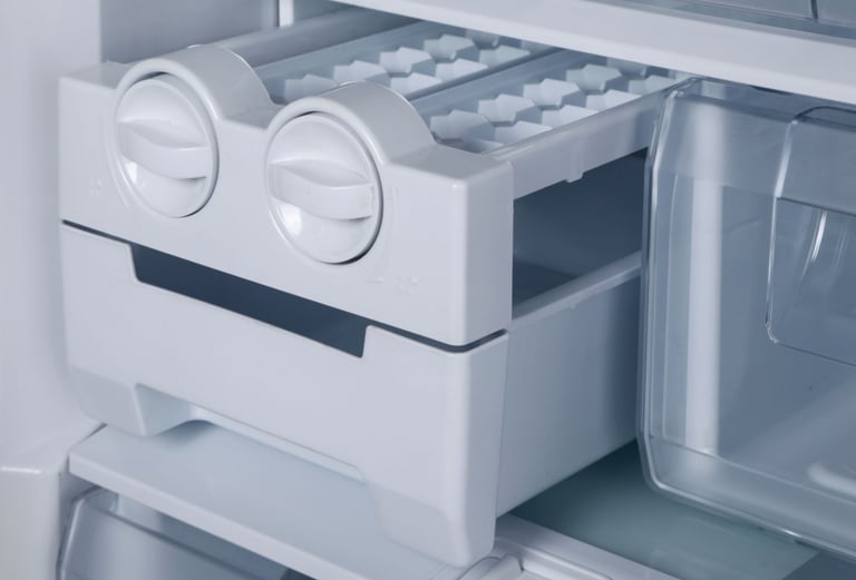 a refrigerator with a refrigerator door open and a drawer with a drawer with a drawer