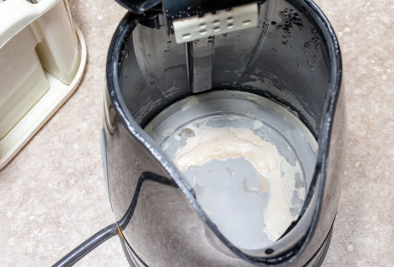 a person is using a blender to make a mess