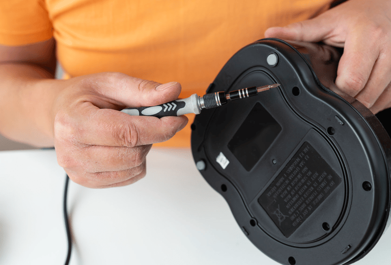 a man is holding a guitar and a guitar