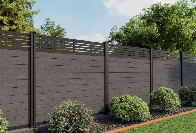 a dark composite fence that is great for compost