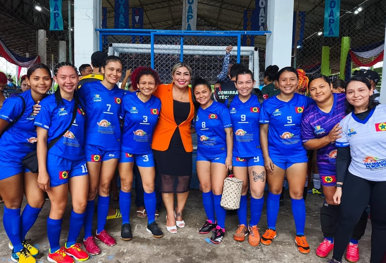 a group of women soccer players posing for a picture