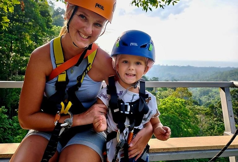 a woman and a child on a zipline hawk adventure koh samui zipline