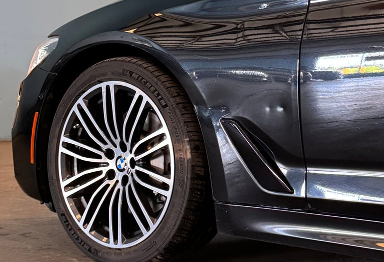 BMW fender damage. Aluminium panel