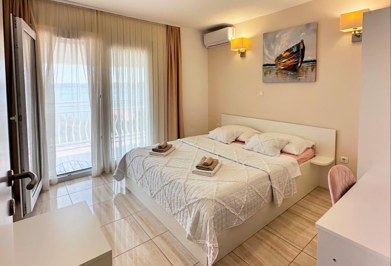 room with bed, closet, window and chair