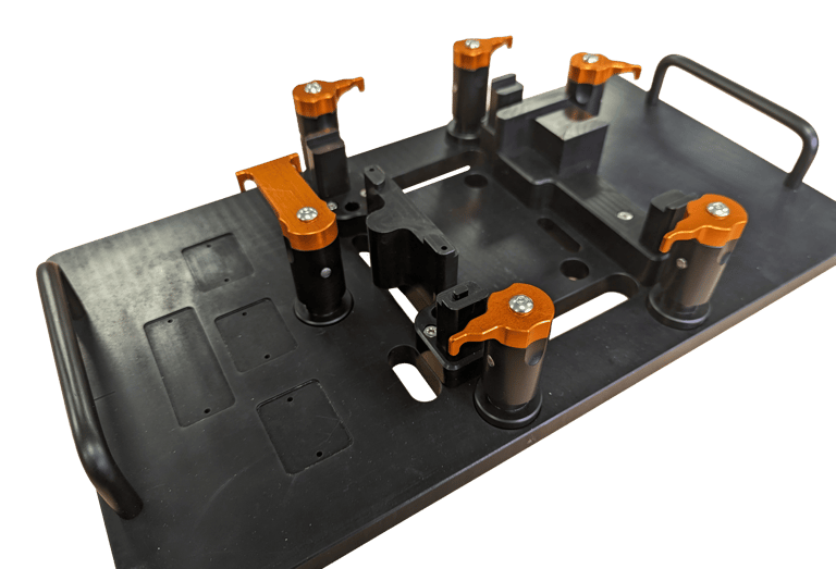 Metrology fixture for clamping various medical components in a single tool.