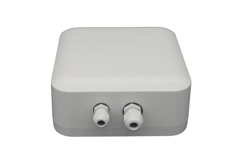Compact white Creanode Gateway unit with rounded edges and two front-facing cable ports