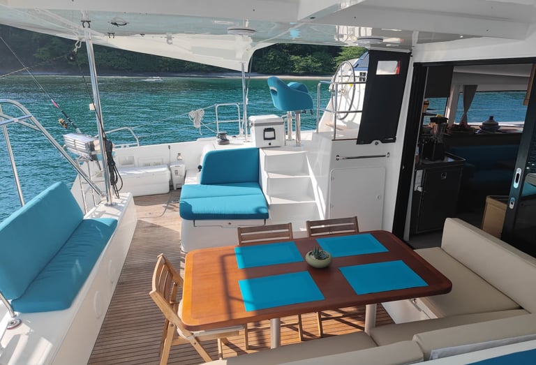 Spacious deck and dining area onboard Kephas luxury catamaran in Papagayo, Costa Rica