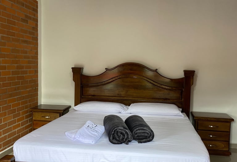 a bed with towels and towels on it