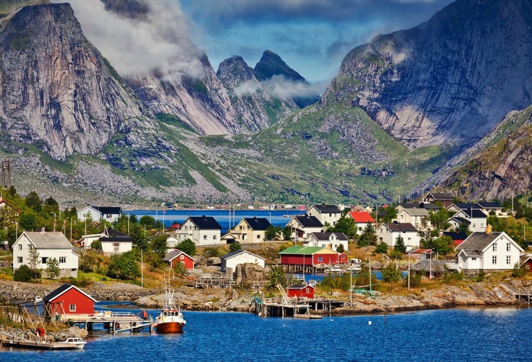 Scenic view of a village in Lofoten with dramatic mountains–home of Maritime Munchies fish and chips