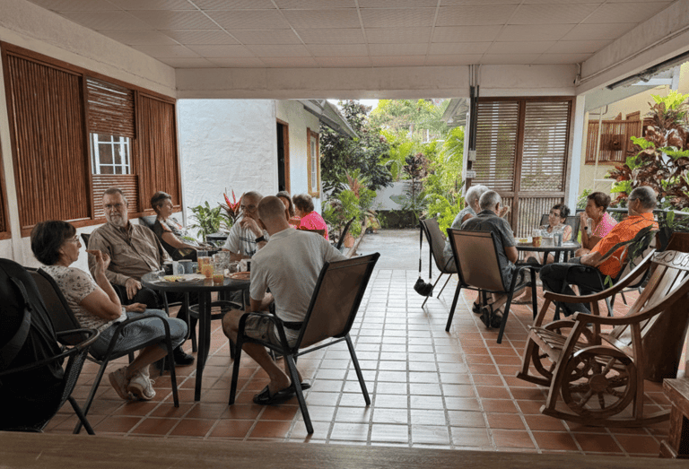 People sharing a meal and spending time together in a dining area in Santa Fe, Veraguas, Panama.