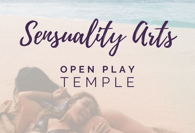 a woman laying on a beach with a woman and woman