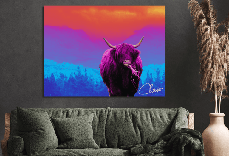 Canvas Print on living room wall with couch underneath it.