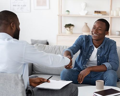 Psychotherapist and Client Sitting