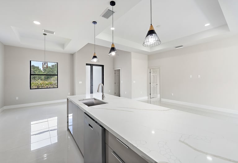 photo of island with calacata marble