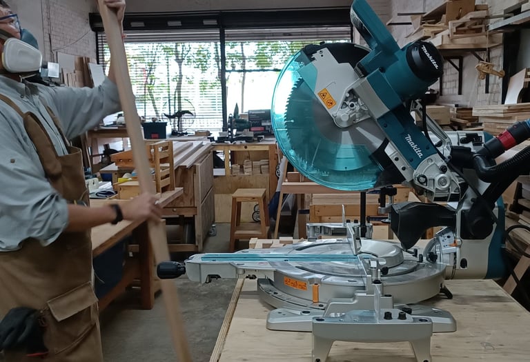 Method of using a mitre saw