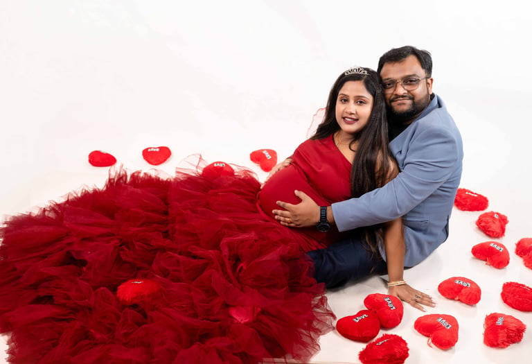 Romantic maternity portrait of parents-to-be at home