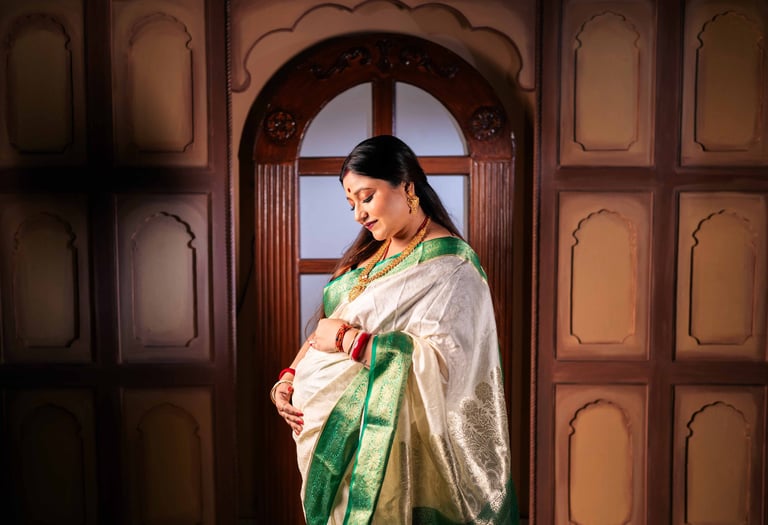 Mother-to-be posing during an indoor maternity photography session