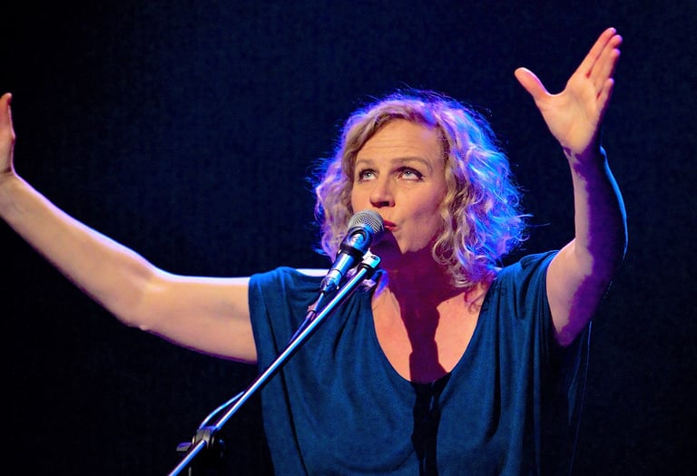 a woman in a black and white photo of a microphone and a microphone