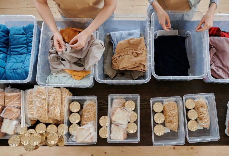 Volunteers sorting food and clothing donations