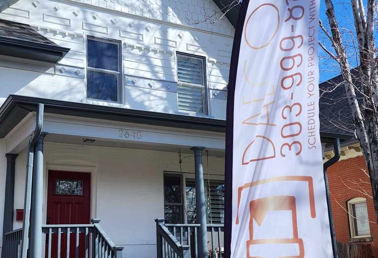 a flag - bearing banner banner flag on a house
