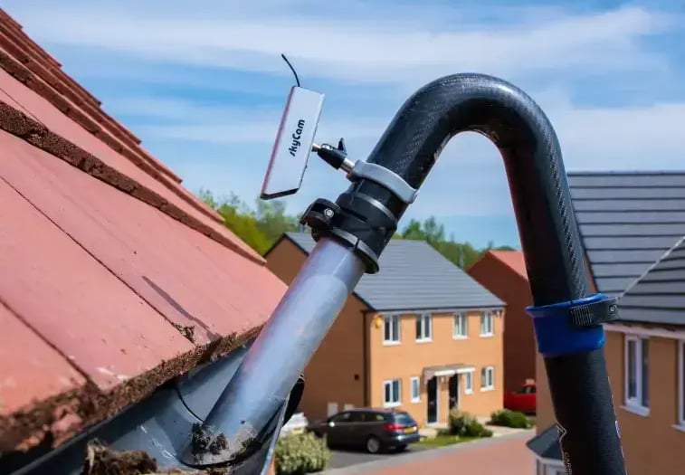 guttering being cleaned by keystone property care