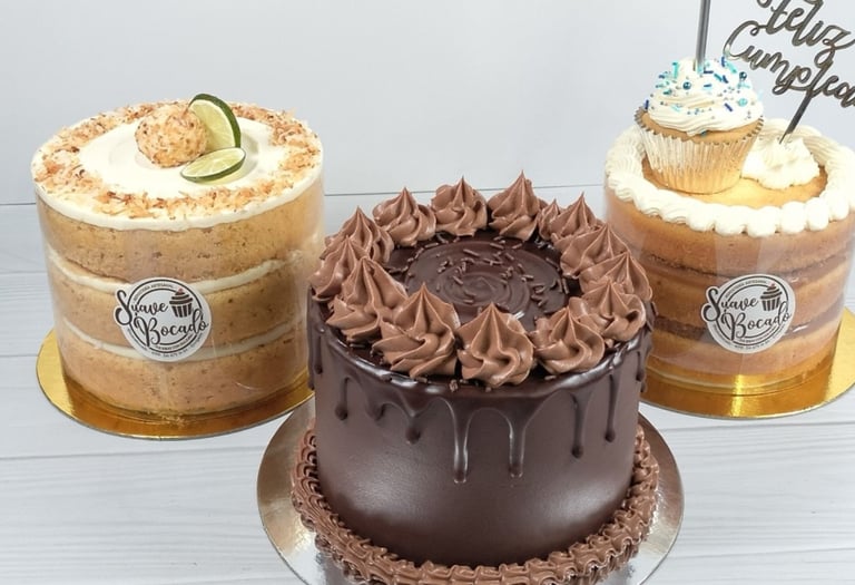 three cakes with chocolate frosting and frosting on them