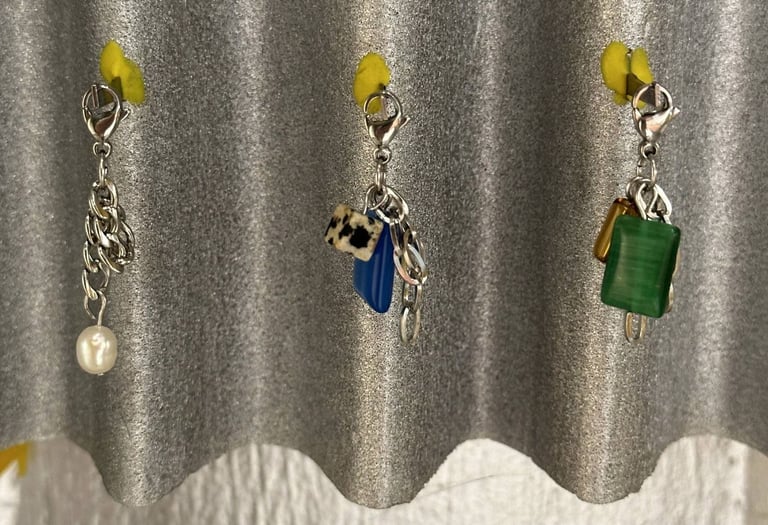 Three fun.arc.ik. necklace charms with pearls, blue stone, Dalmatian jasper, and green stone