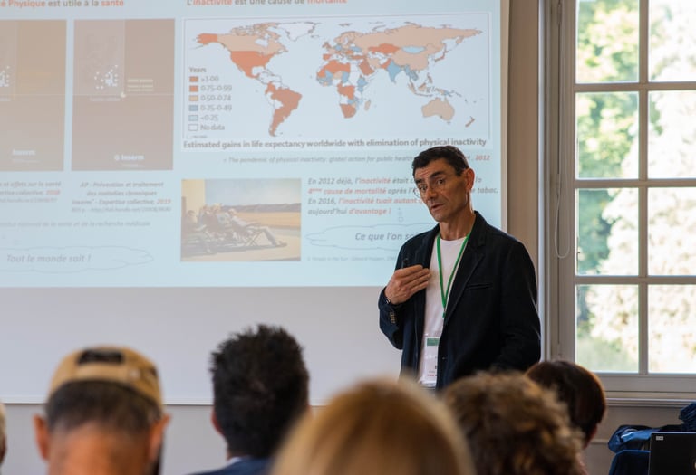 a man standing in front of a presentation on a presentation