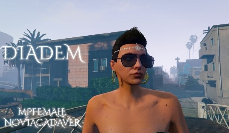 a man in a black top hat and sunglasses