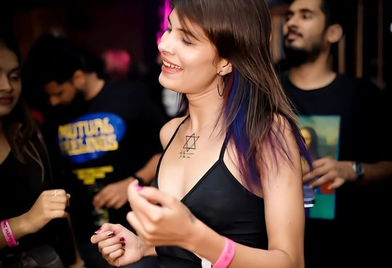 a woman with a tattoo on her chest and a tattoo on her chest