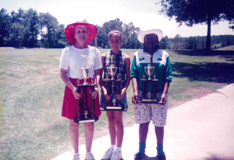 Par Four Golf Club image of three women golfers winners