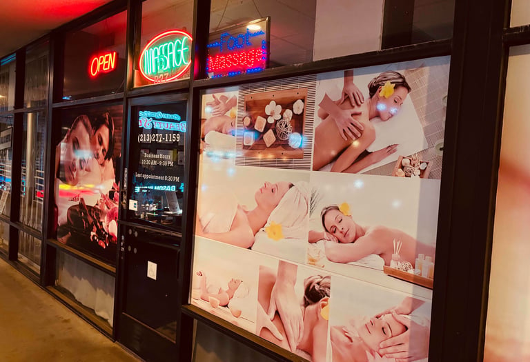 a storefront door with a large display of baby's