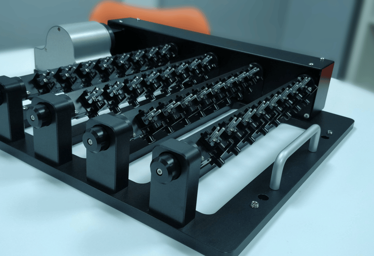 Multi-nest tumble metrology fixture with multiple nest for high throughput inspection