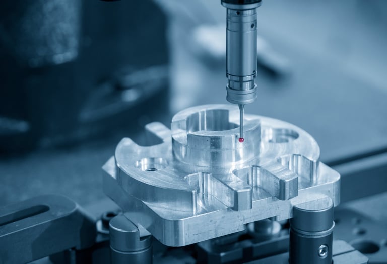 Renishaw TP200 and stylus probing a precision machined component.