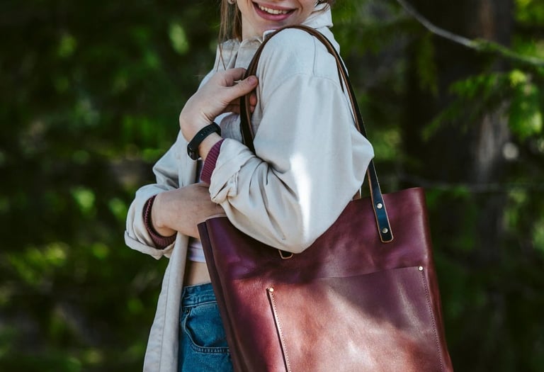 a woman in a white shirt and jeans jacket
