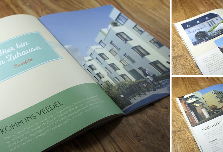 A printed real estate brochure for Ehrenfeld apartments featuring modern architecture and urban lifestyle photography.