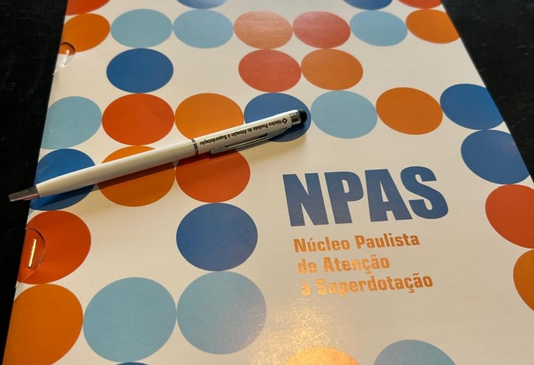 a pen and pen on a notebook with a pen