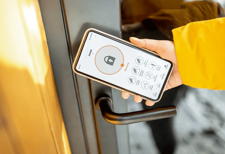 Smartphone unlocking digital door lock. Smart tech upgrades for Cedar Rapids business owners.