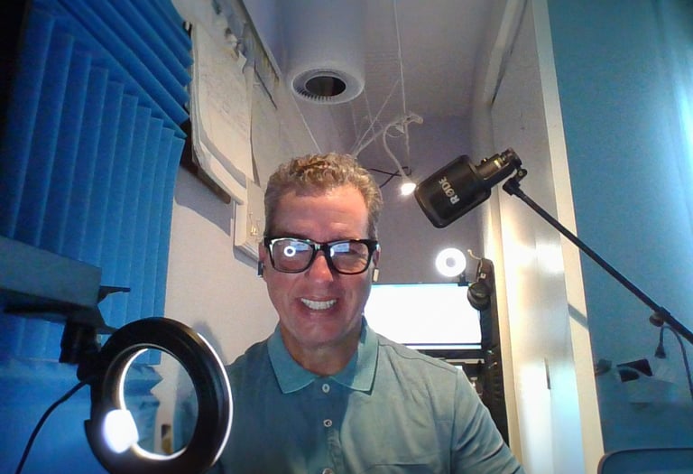 Eric DeRise, a dynamic Instructional Designer and Video Producer working in his studio.