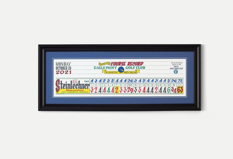 A framed piece of scorecard artwork for the course record at Eagle Point Golf Club.