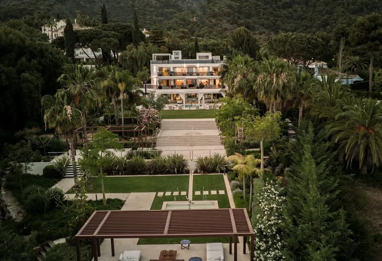 Villa Serenity aerial view with gardens and mountain backdrop