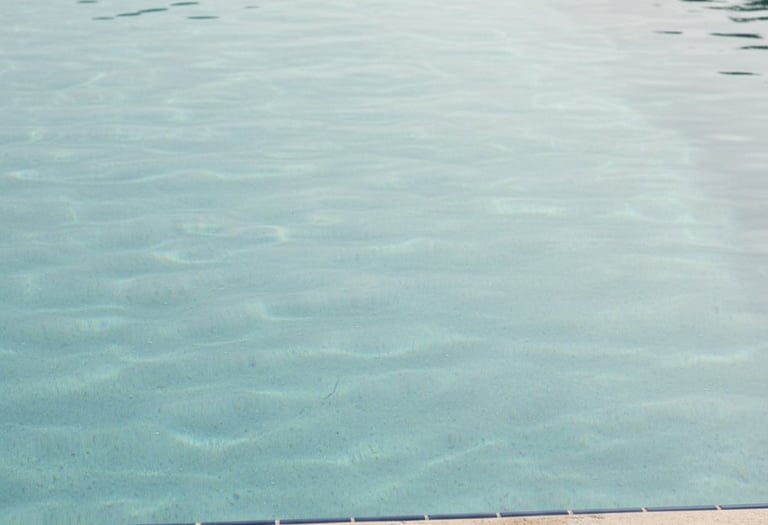 Close-up of cloudy pool water in Austin, Texas