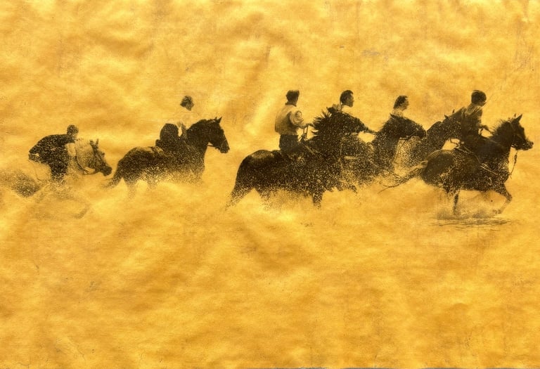 Gold and Platinum photo of a group of people riding horses in the sea