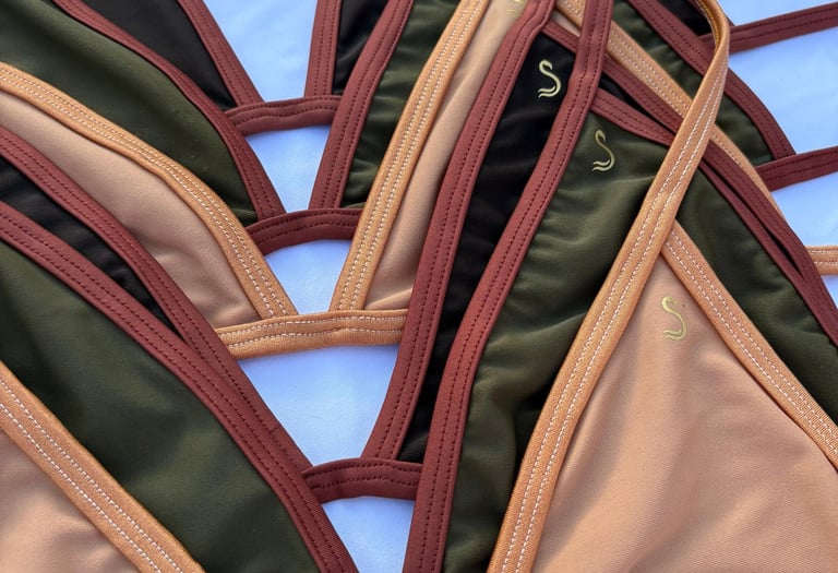 a person holding a piece of clothing with a name on it