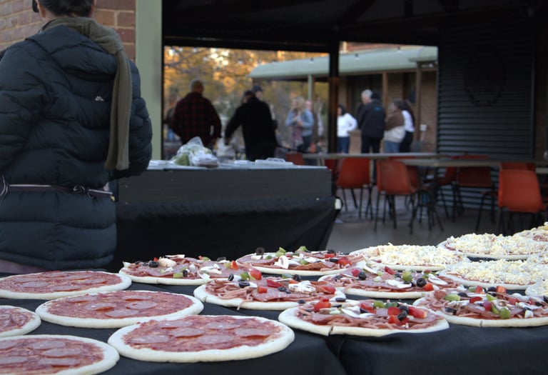 Our team preparing pizzas at a party in country Victoria.