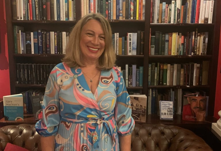 Photo of Averil Leimon in the library of the Caledonian Club