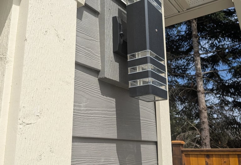 Siding and exterior light with weatherproof sealing and careful trim painting