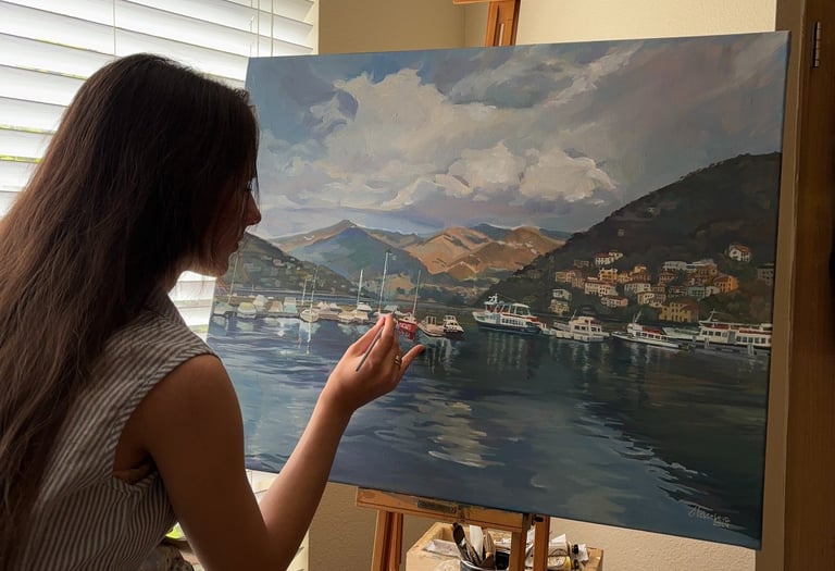 Angela Moiseieva at work on 'Whispers of Como' 24x30 inches Serene Harbor oil painting